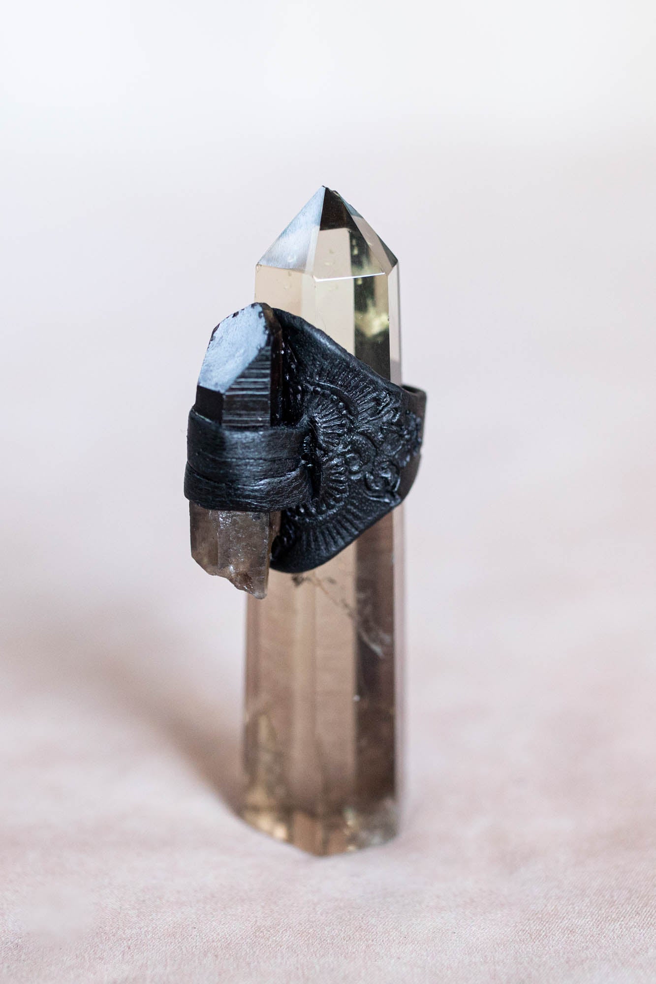  tooled black leather ring with crystal